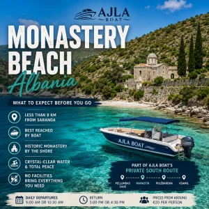 Ajla Boat anchored at Monastery Beach, Albania, with the historic stone monastery on the hillside above the shore